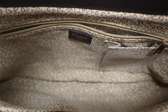 A Cartier Panthere textured brown leather shoulder bag, with signature gold-toned panther decoration to front